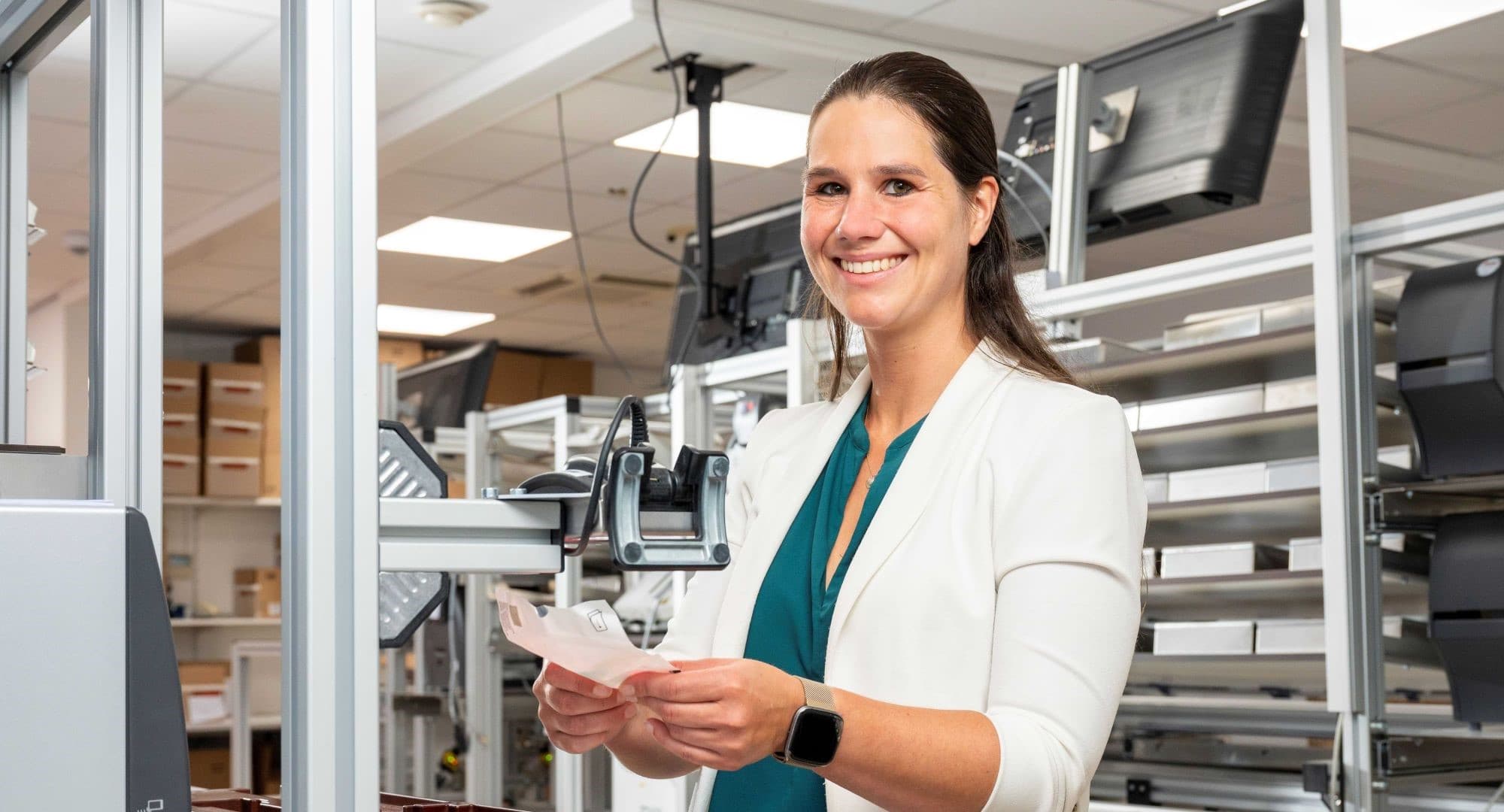 Ophtec employee making orders ready for shipment